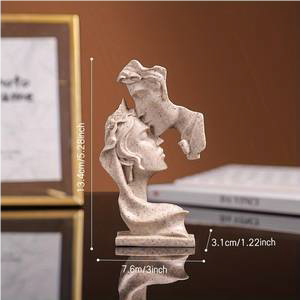 Deseos y Motivos escultura beso de pareja